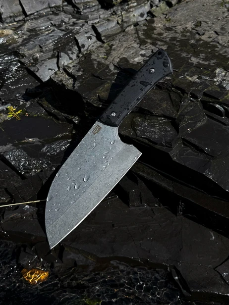 Tasak serbski rękojeść G10, wykończenie stonewash w użytku